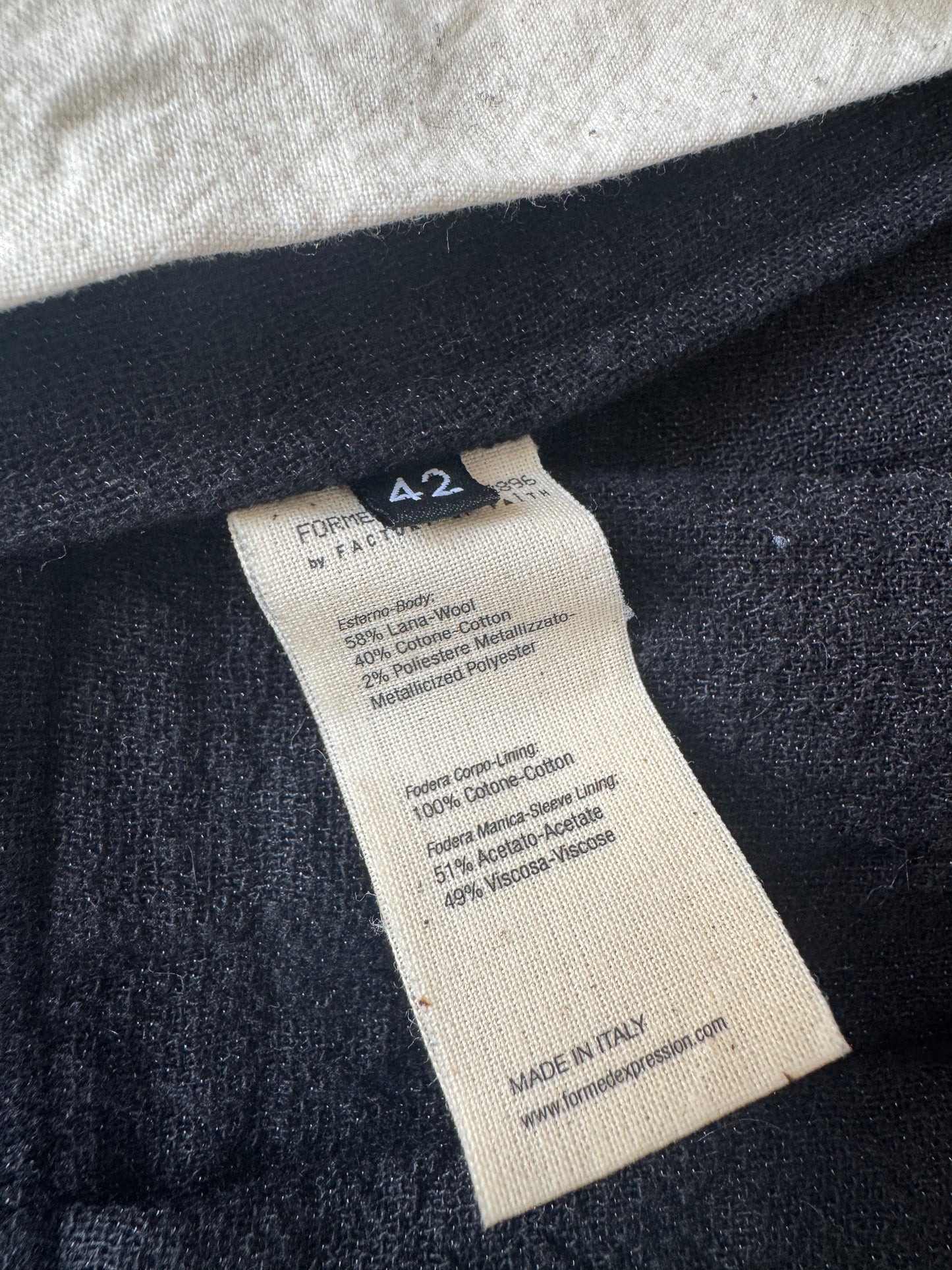 forme d’expression buttoned coat