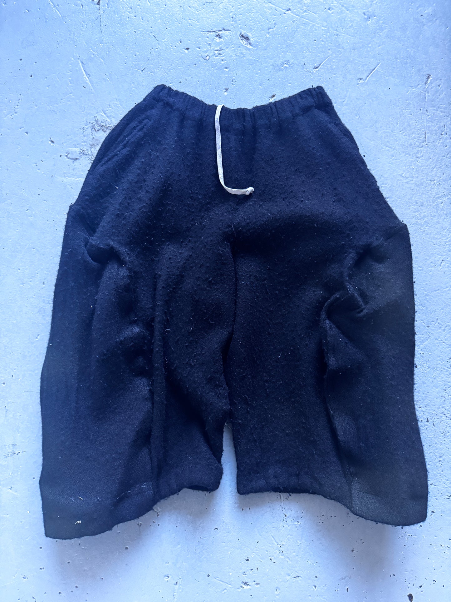 comme des garcons sructured boiled wool shorts