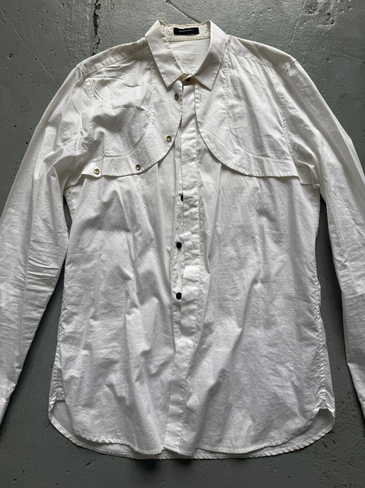 unconditional loop breast shirt