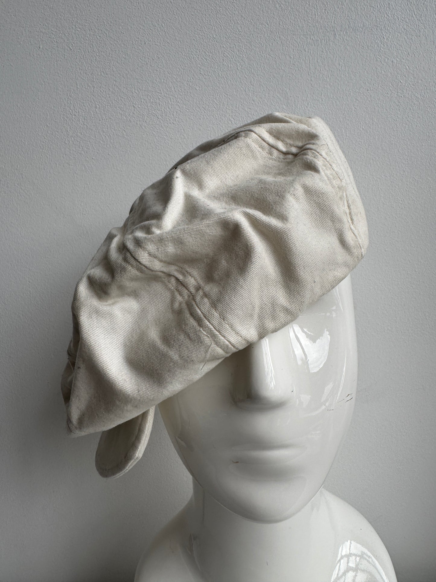 white buttoned casquette hat