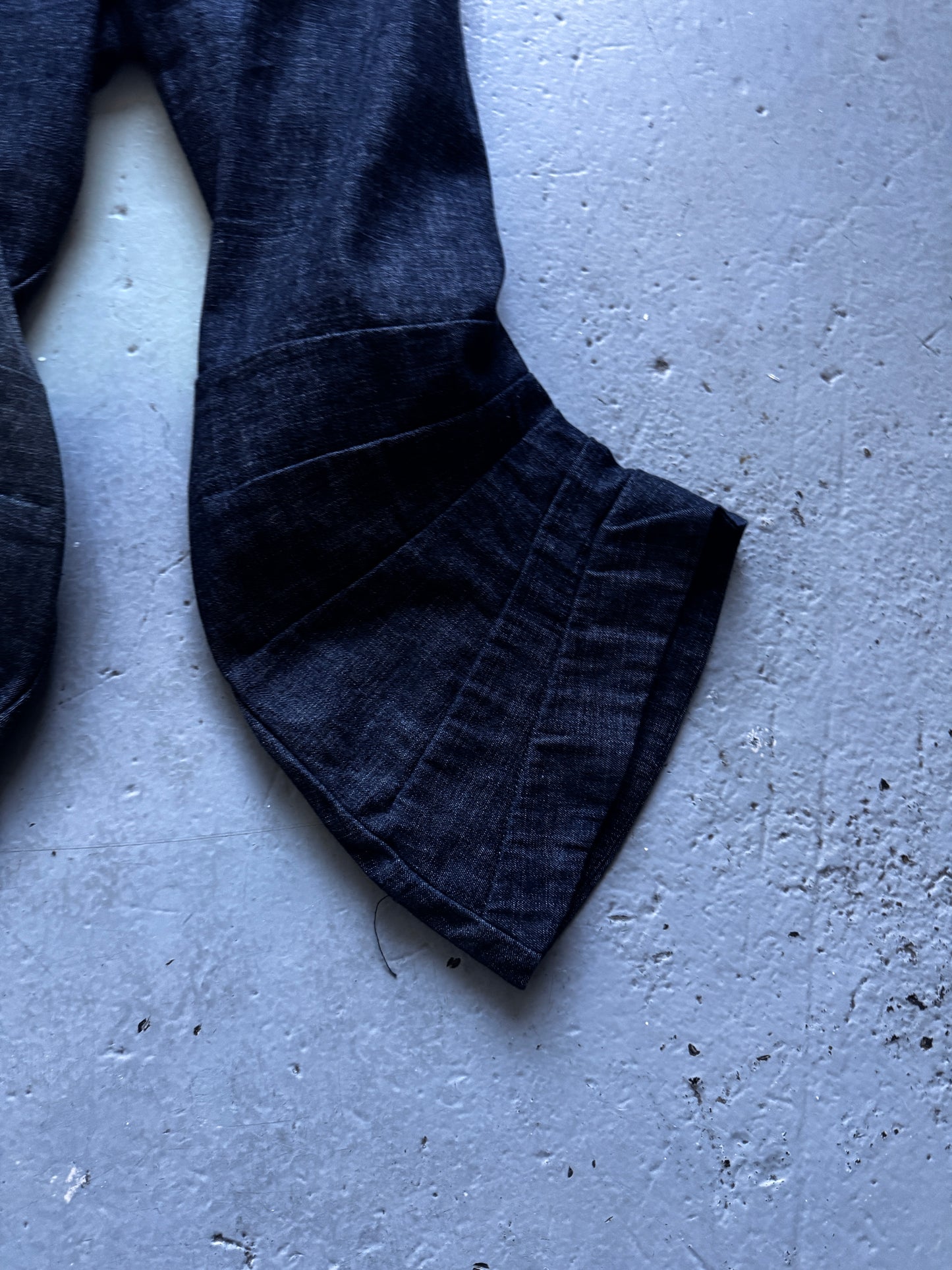 threeasfour twisted leg denim