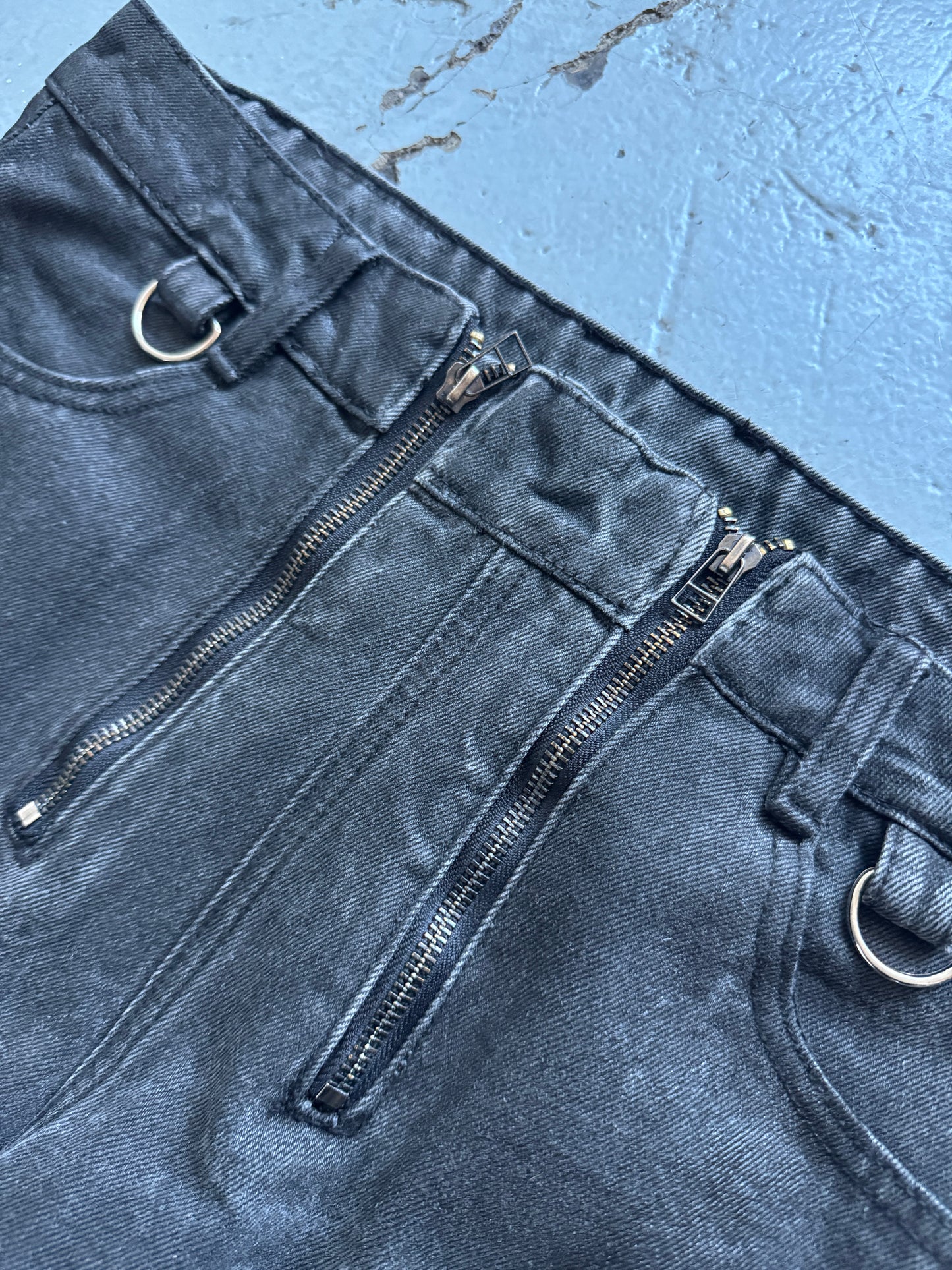 troubled waters zip waist distressed denim