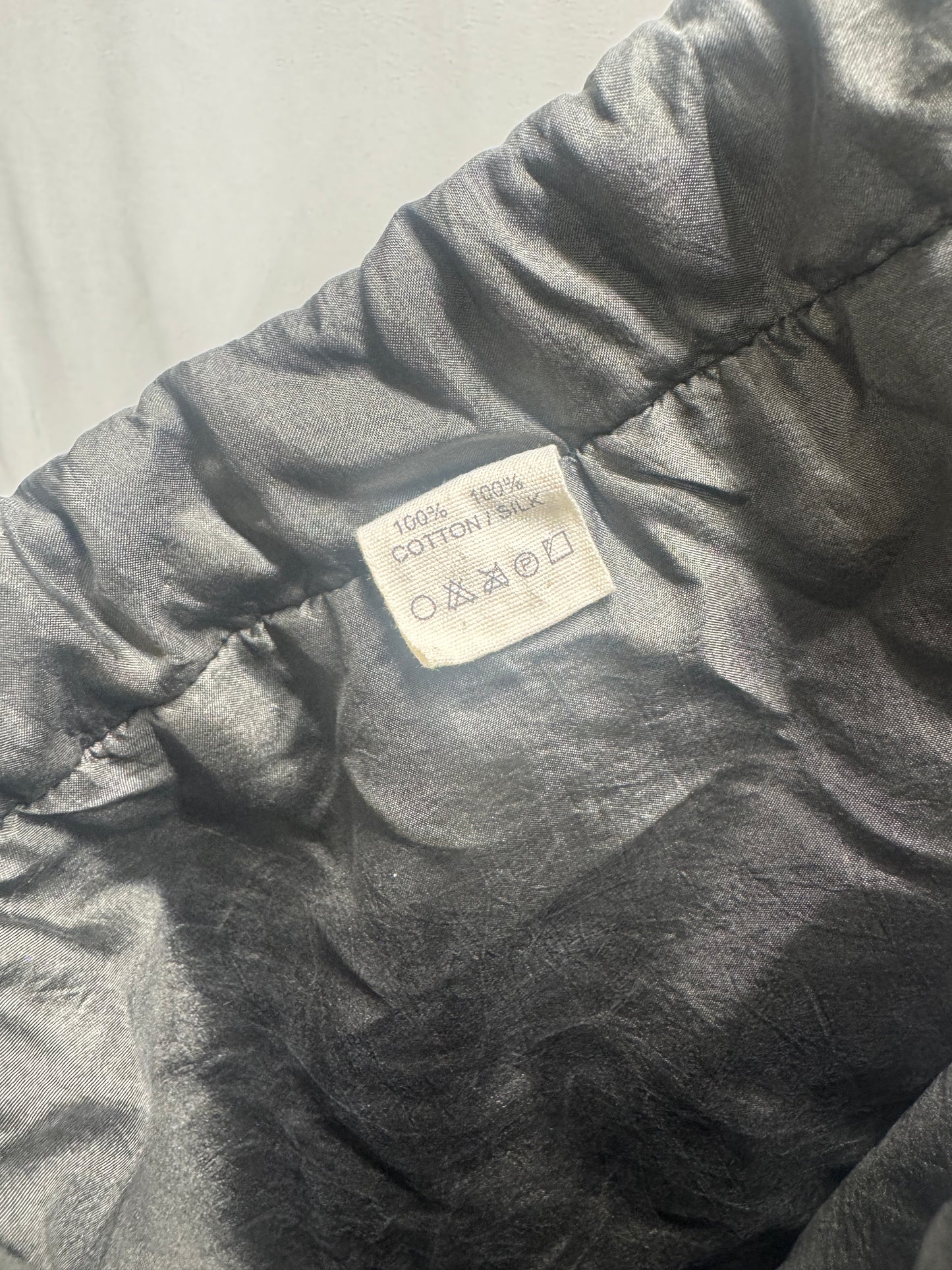 egg trading padded silk drop crotch crop trousers
