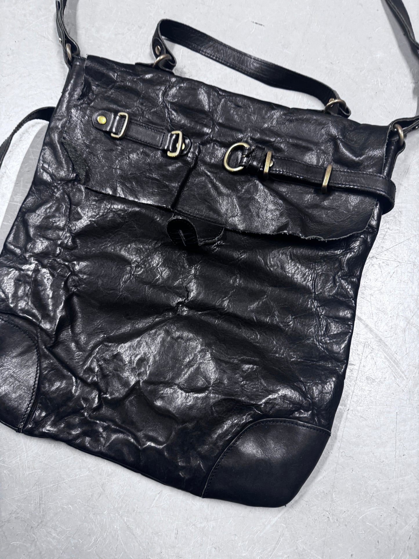 Share Spirt Raw Leather Bag