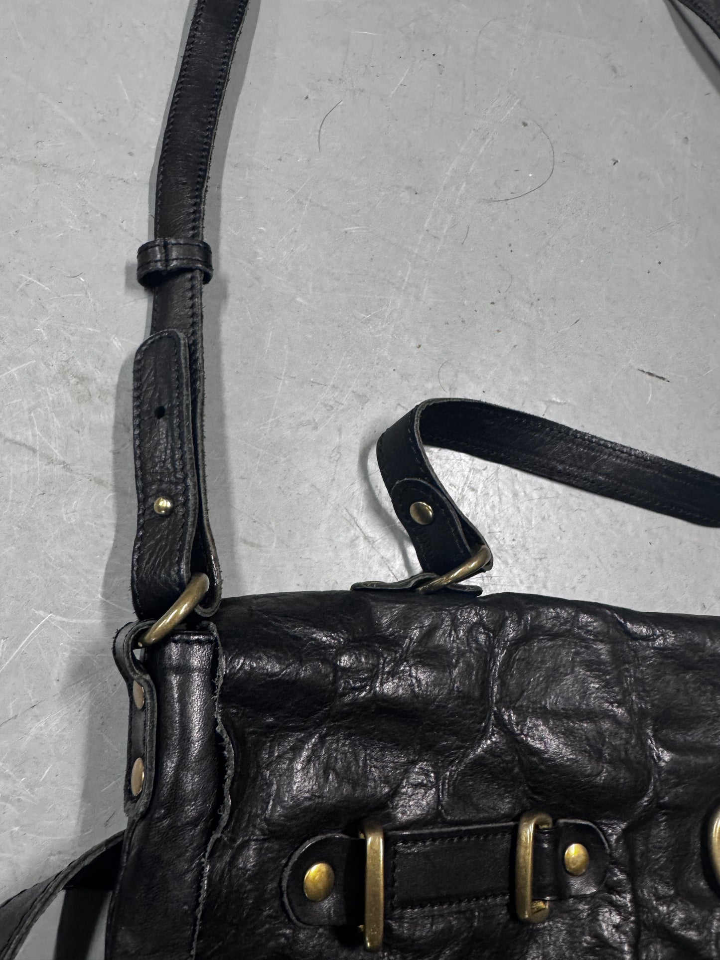 Share Spirt Raw Leather Bag