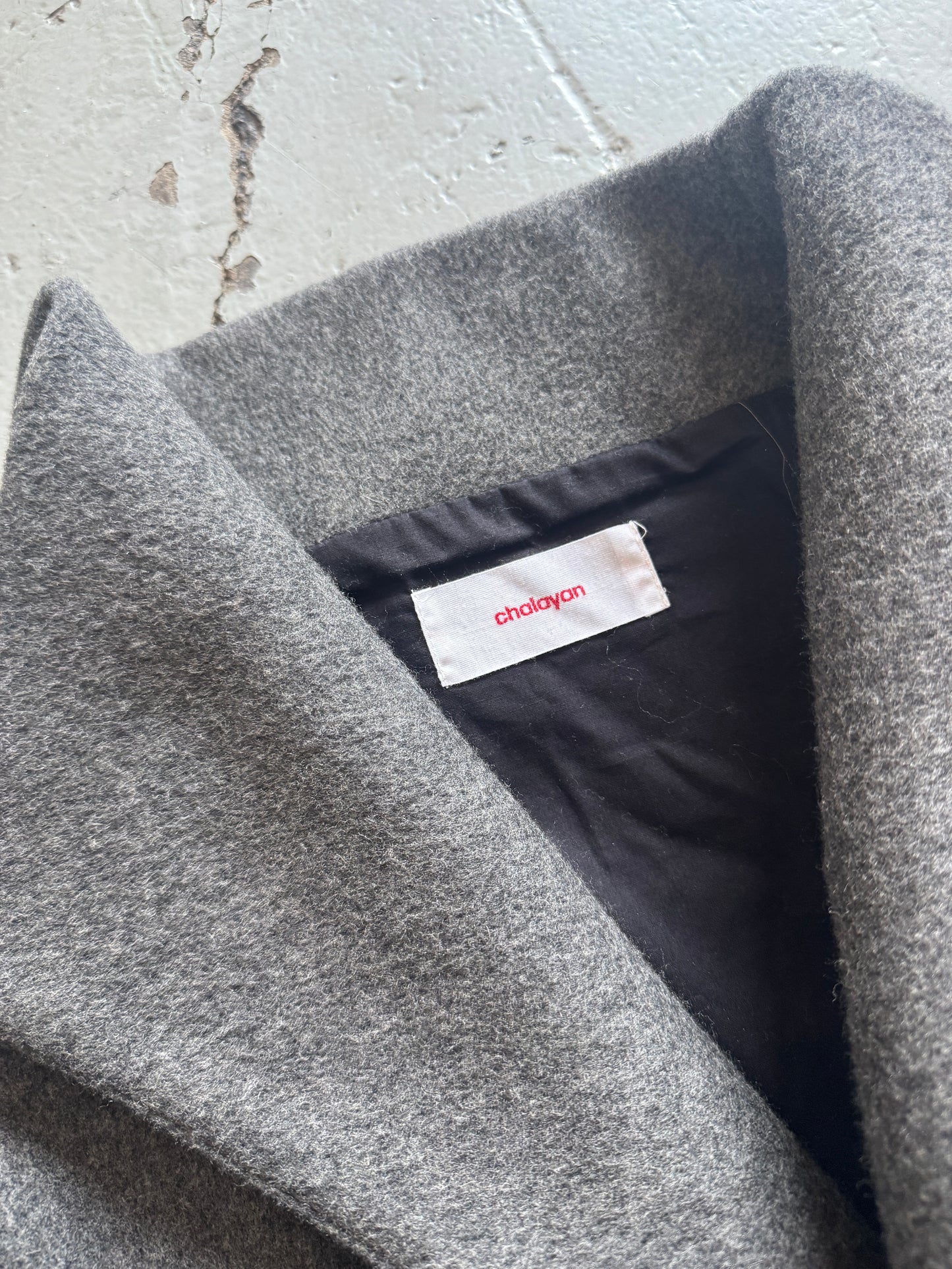 hussein chalayan cross front wool coat