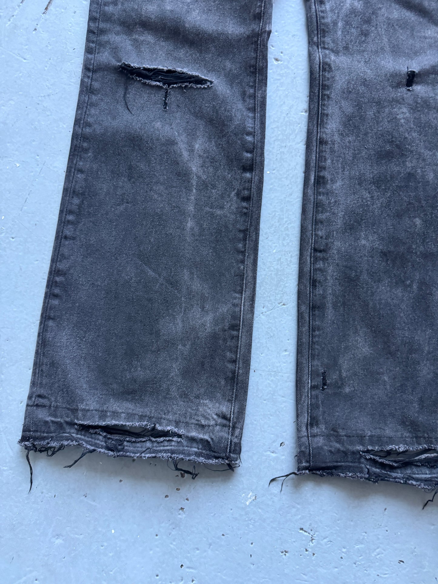 troubled waters zip waist distressed denim