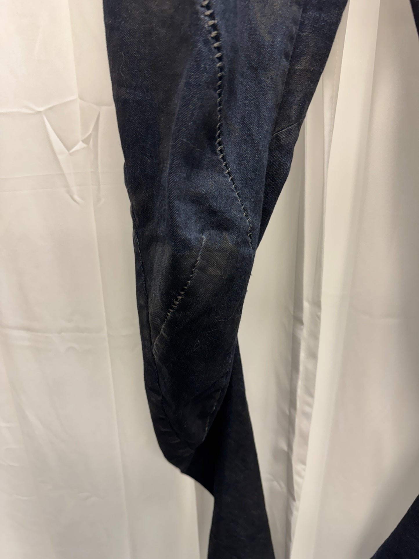 D.Hygen Twist Cut Overlocked Oil Jeans