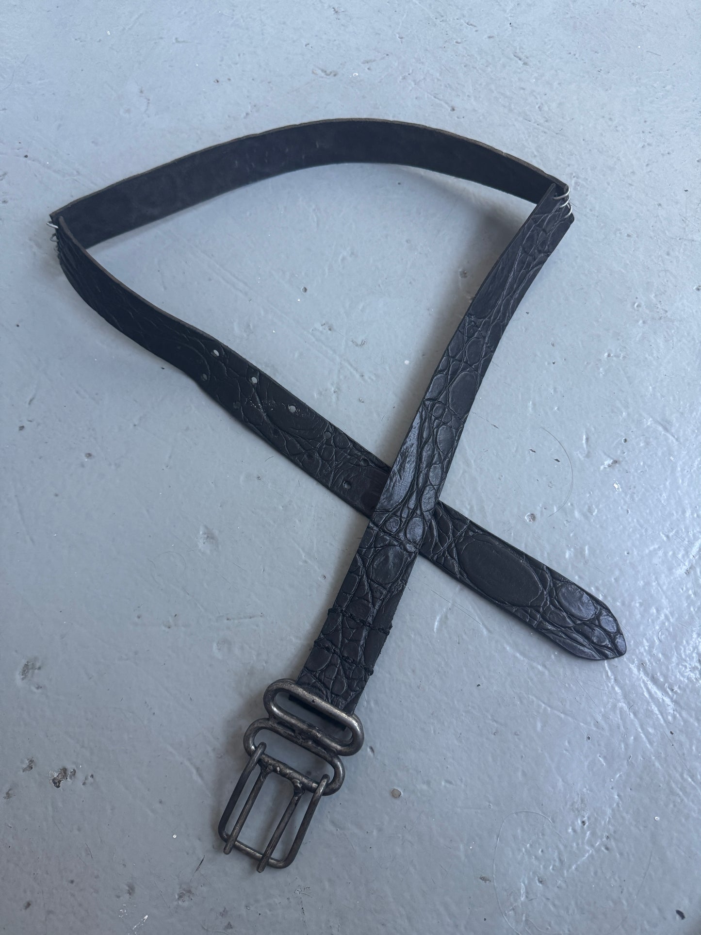 objet pierced crocodile effect leather belt