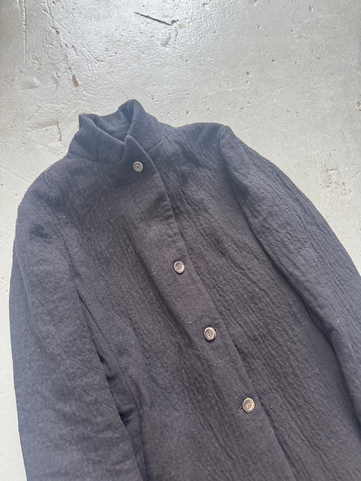 forme d’expression buttoned coat
