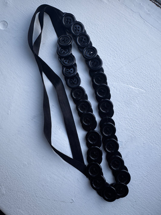 button necklace / tied accessory