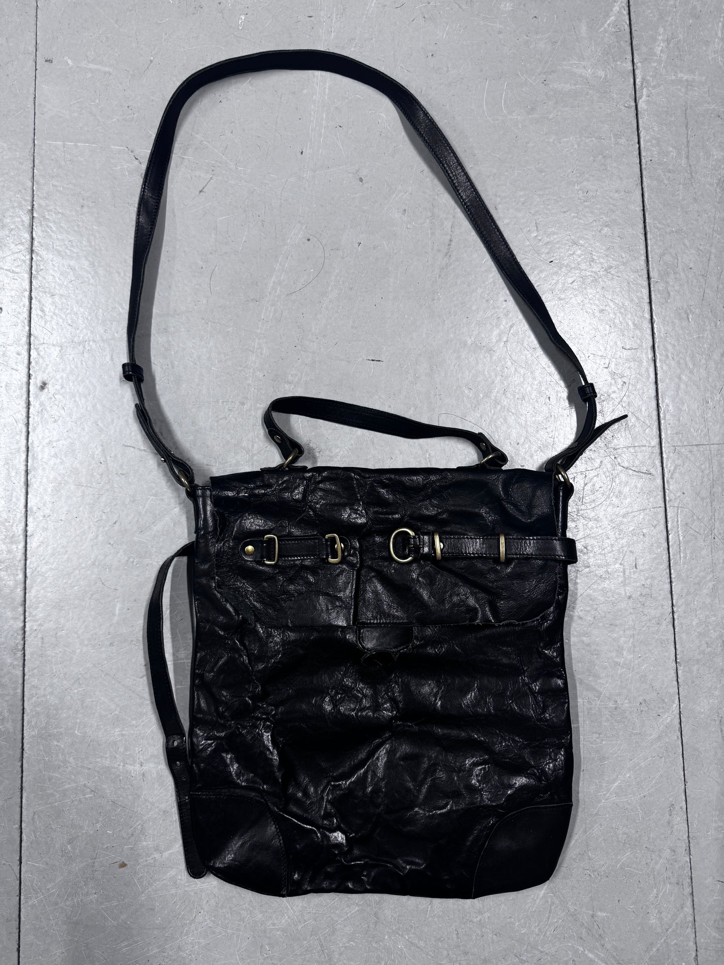 Share Spirt Raw Leather Bag