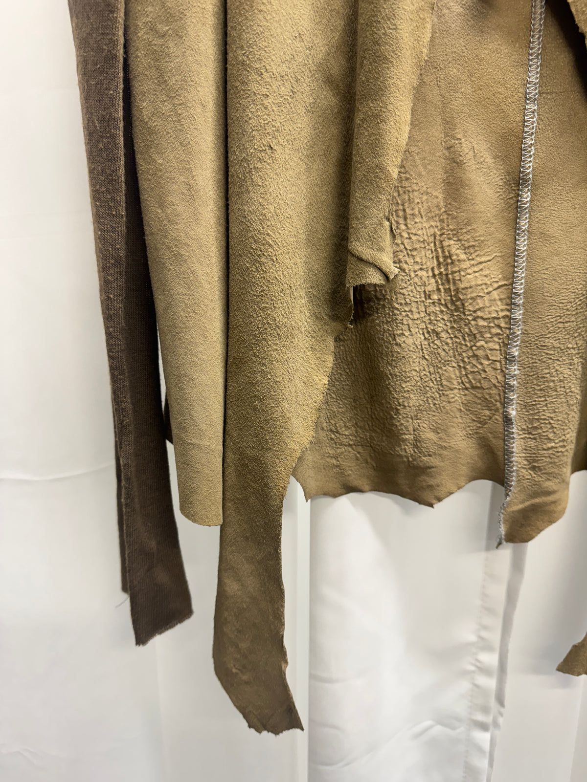 Isaac Sellam Experience — leather & knit tie jacket