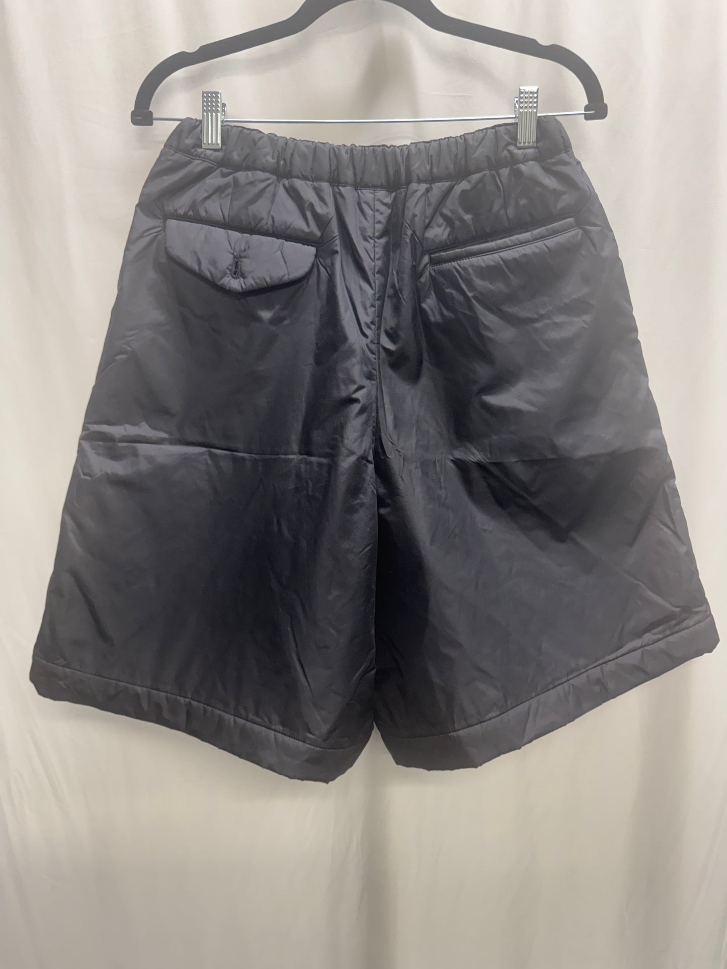 comme des garçons black padded nylon shorts