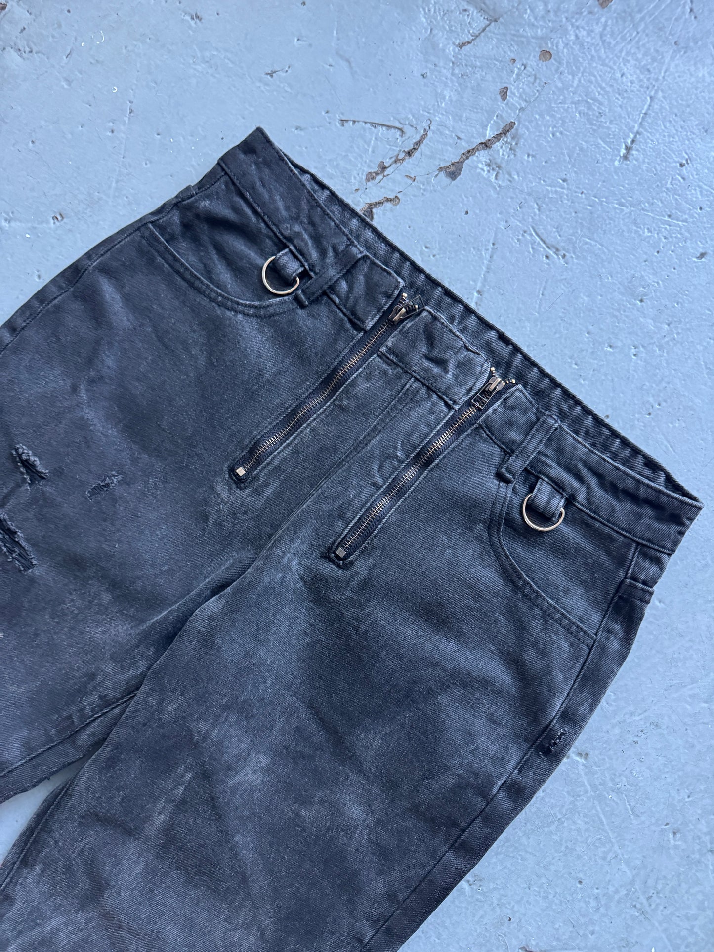 troubled waters zip waist distressed denim