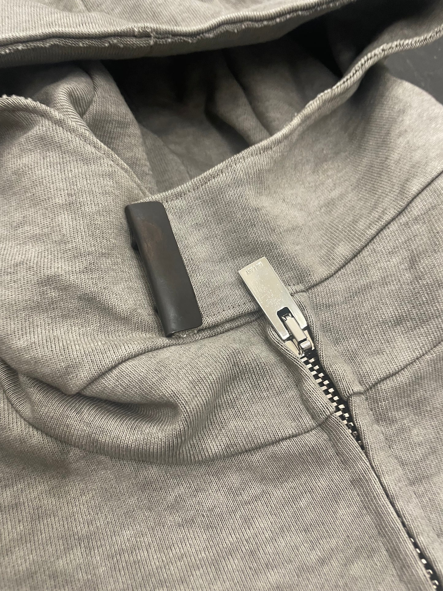 MN Last Tape Seam High Neck Hooded Jacket