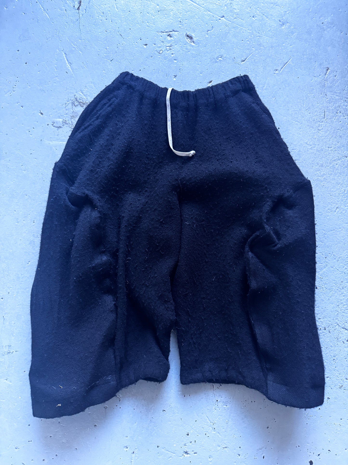 comme des garcons sructured boiled wool shorts
