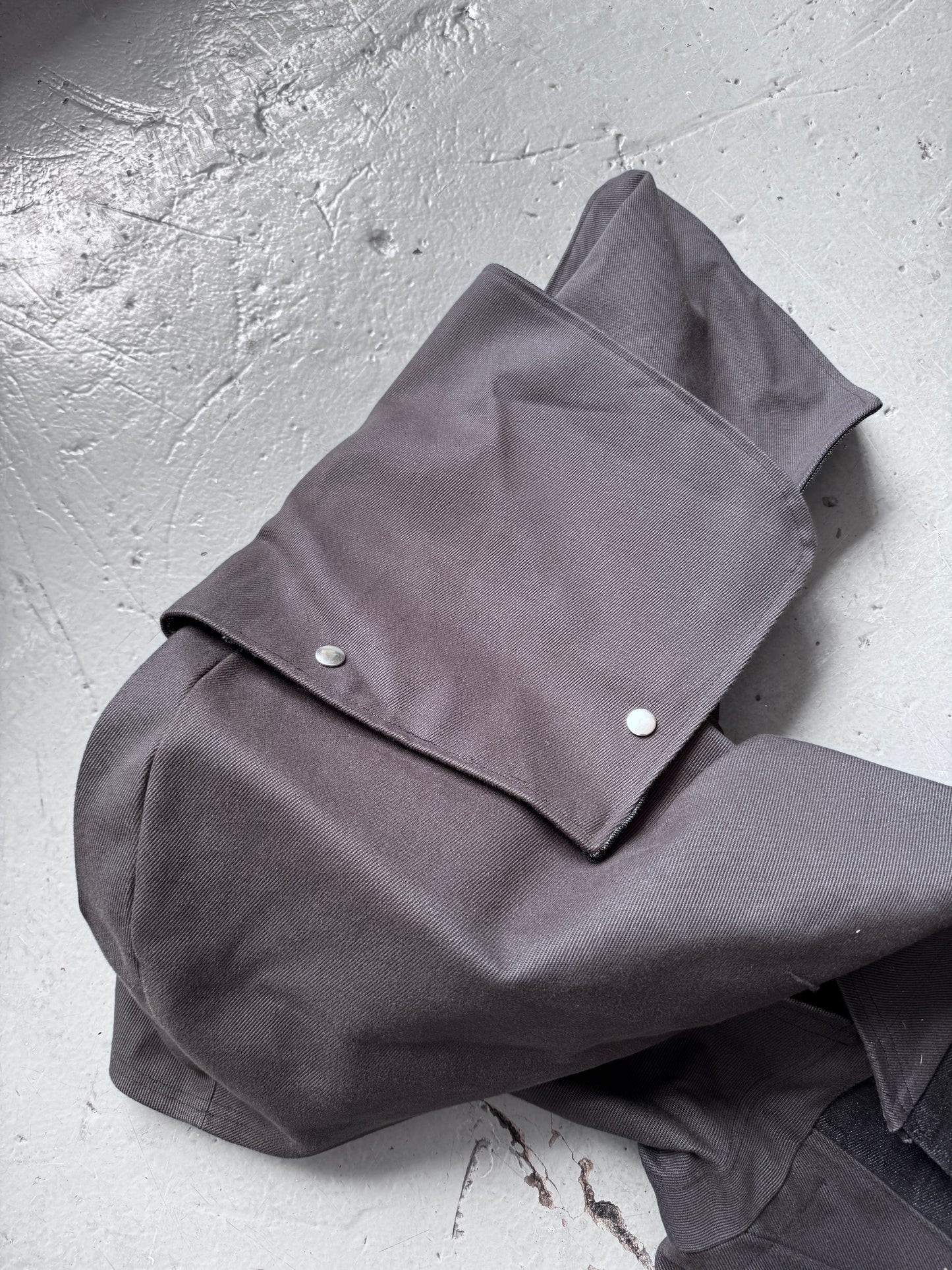 econbot denim pointed sleeve articulated alien coat