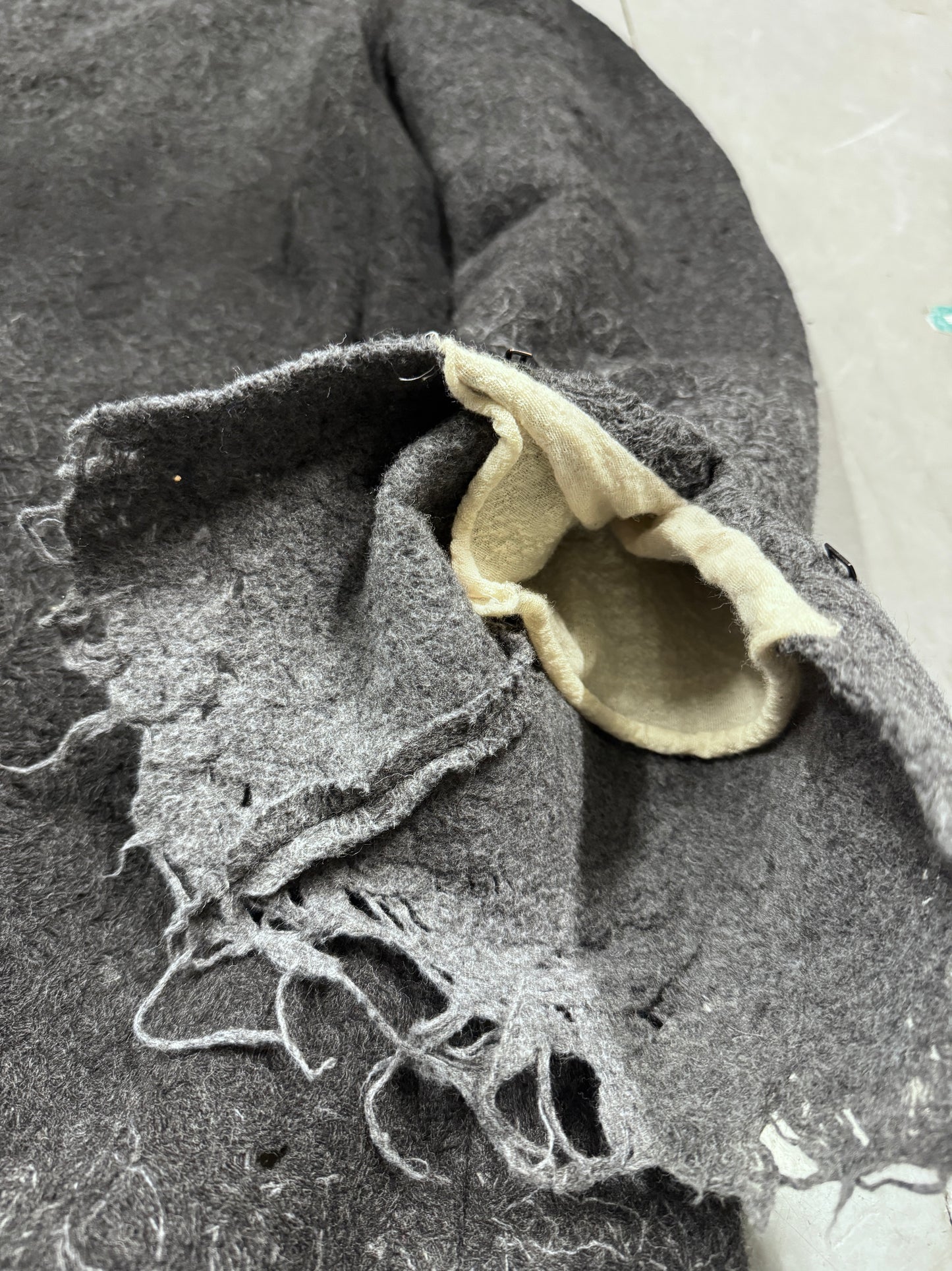 Lumen Et Umbra Distressed Knit high Neck Coat