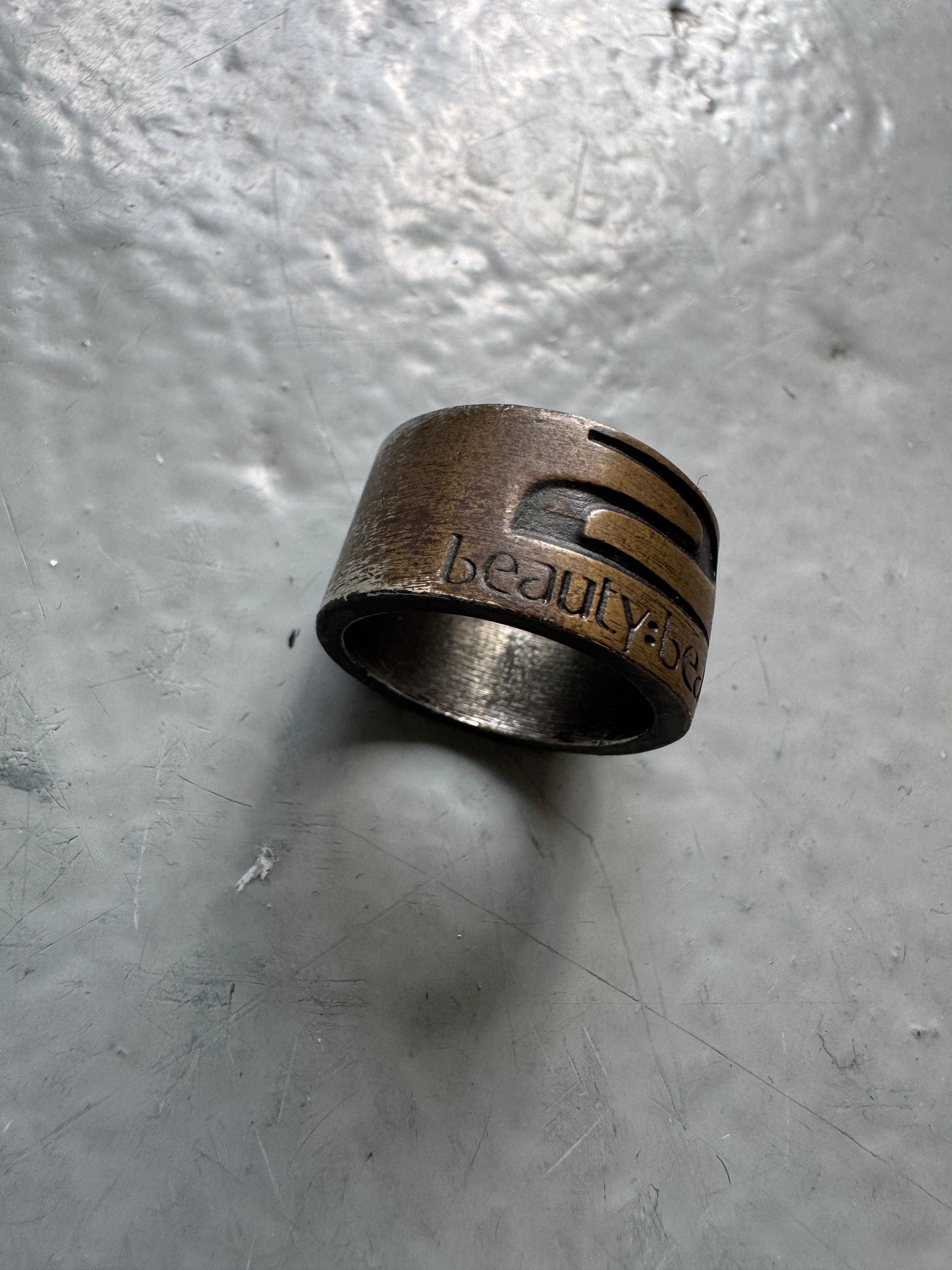 beauty:beast brass logo ring