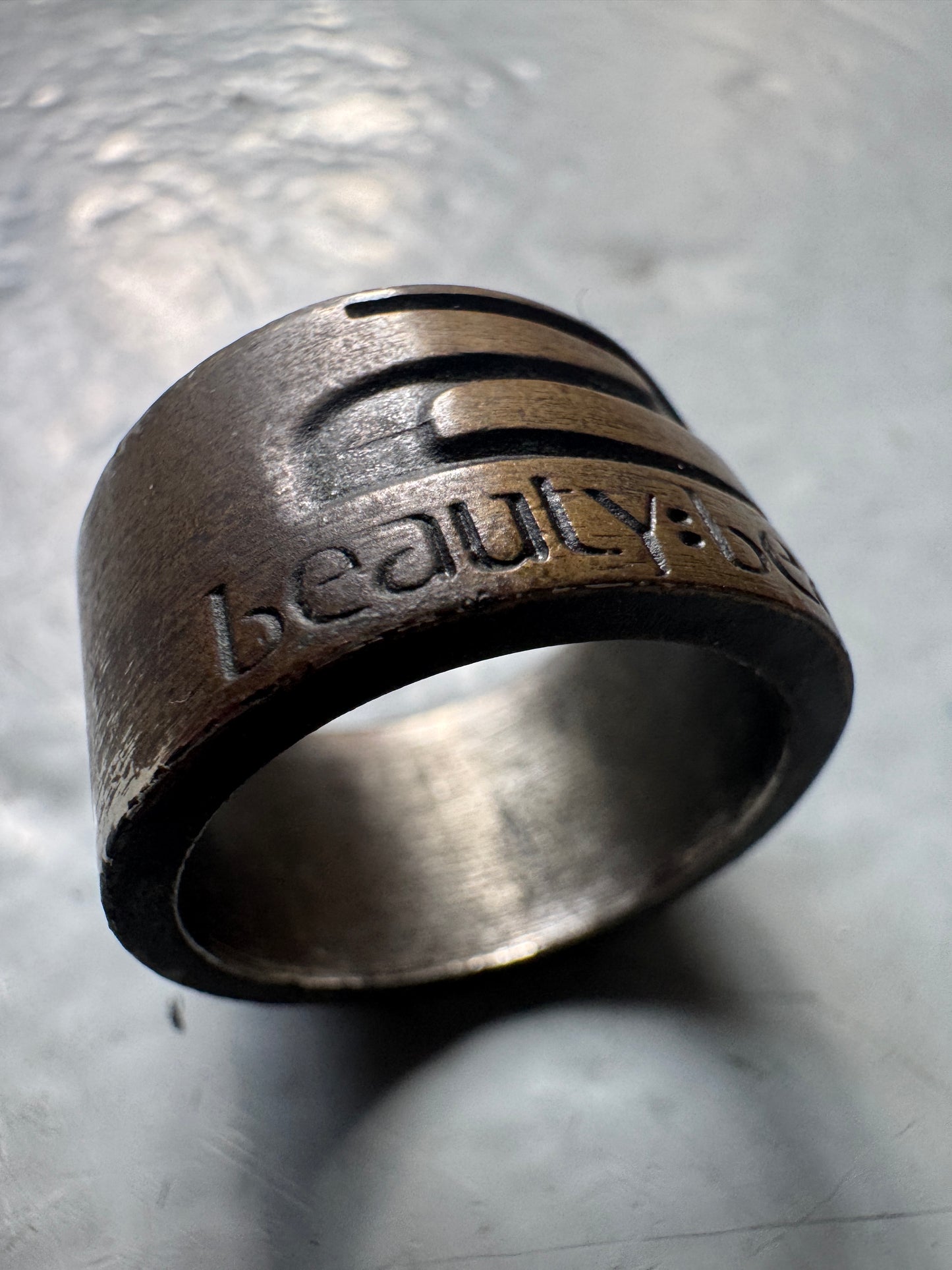 beauty:beast brass logo ring