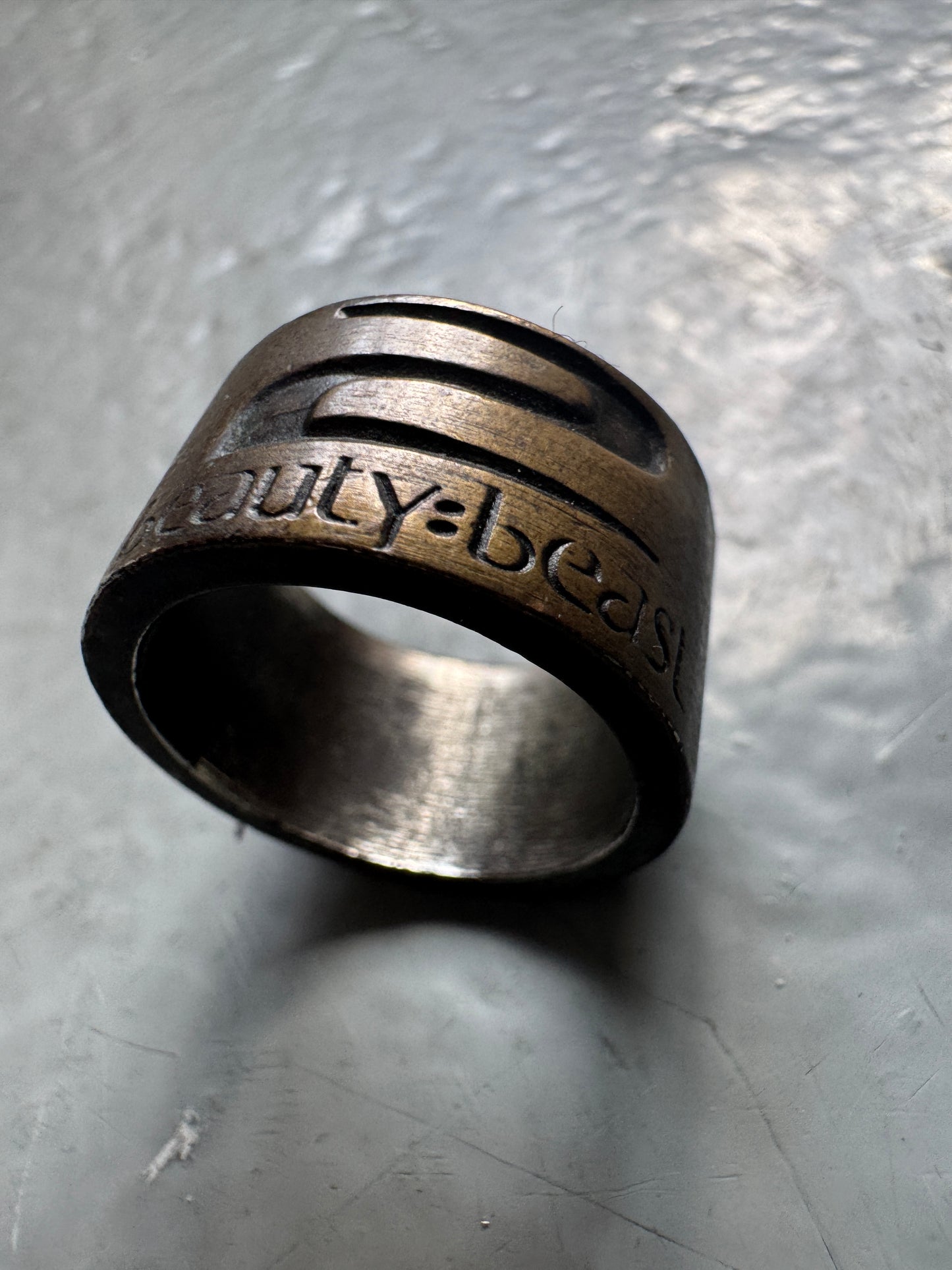 beauty:beast brass logo ring