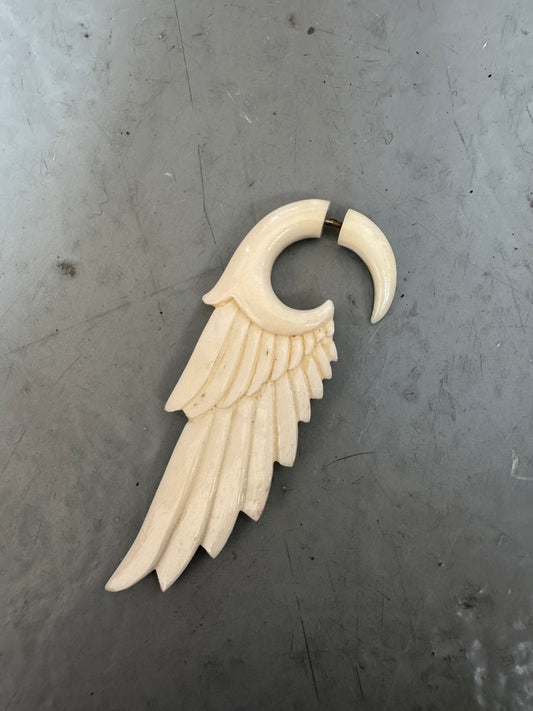 vintage carved angel wing earring