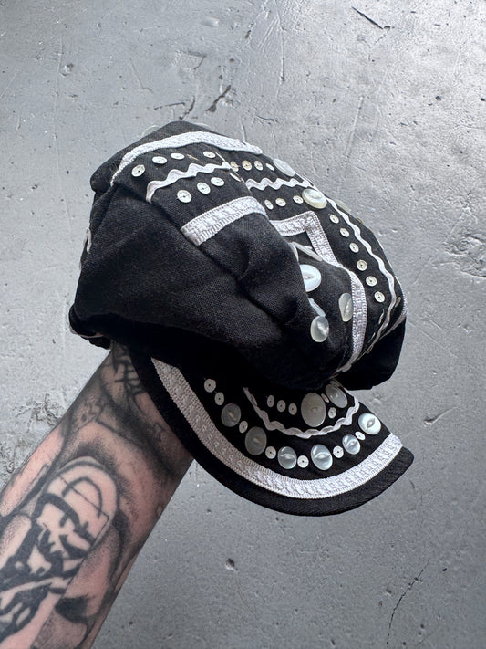 Antique buttoned Cap