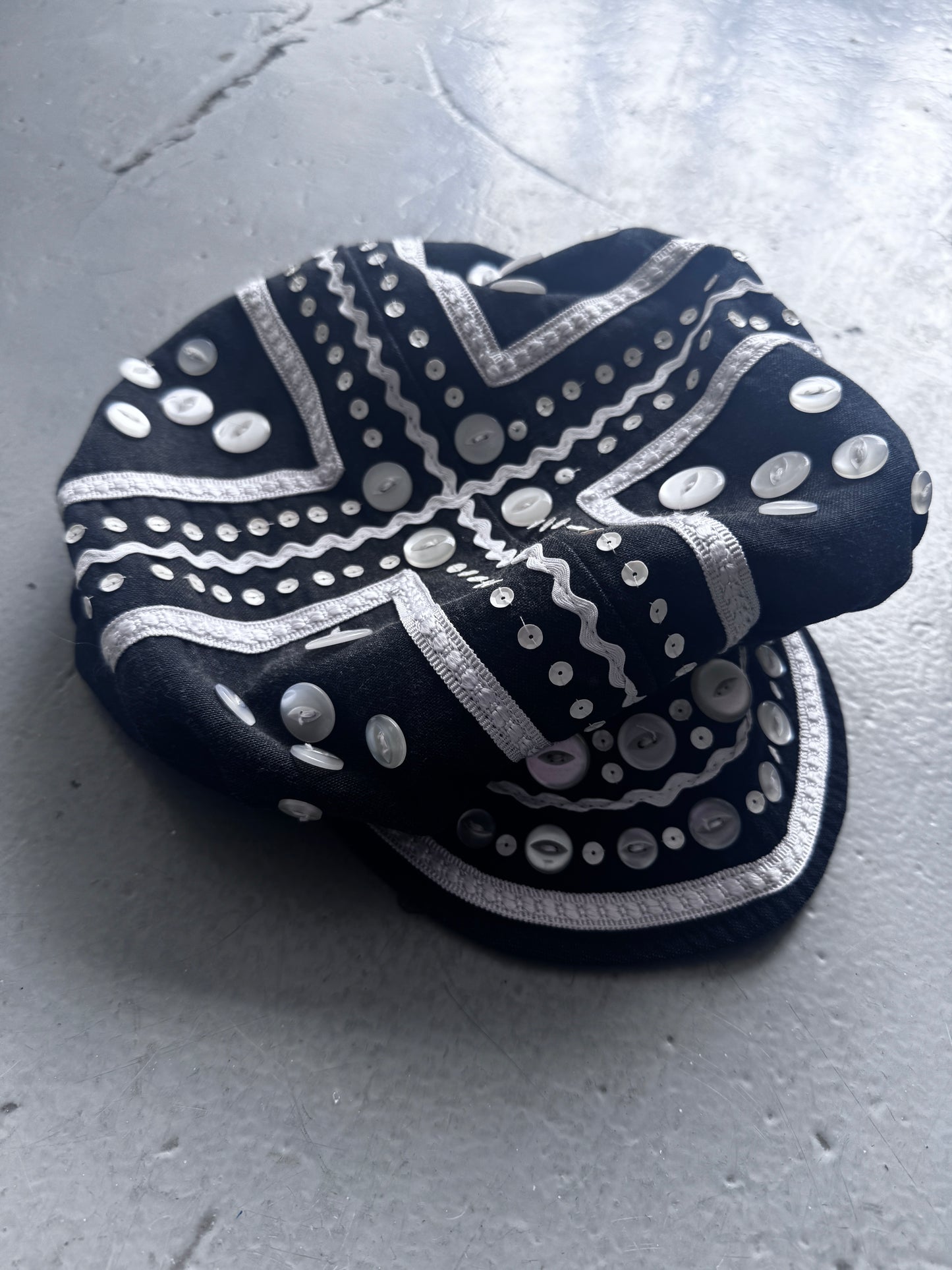 Antique buttoned Cap