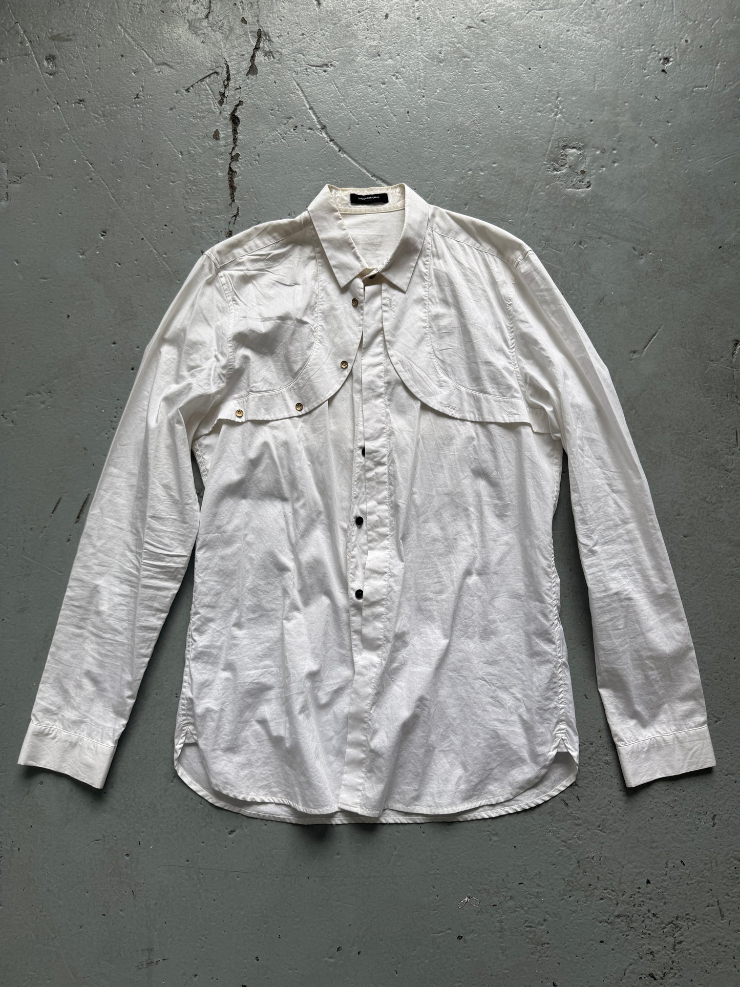 unconditional loop breast shirt