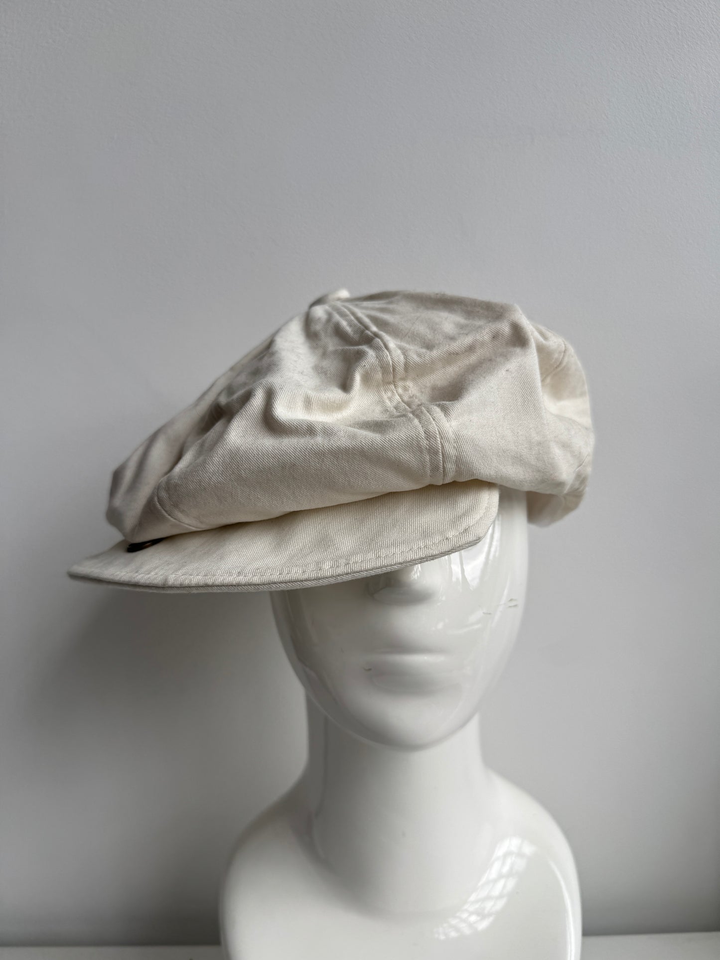 white buttoned casquette hat
