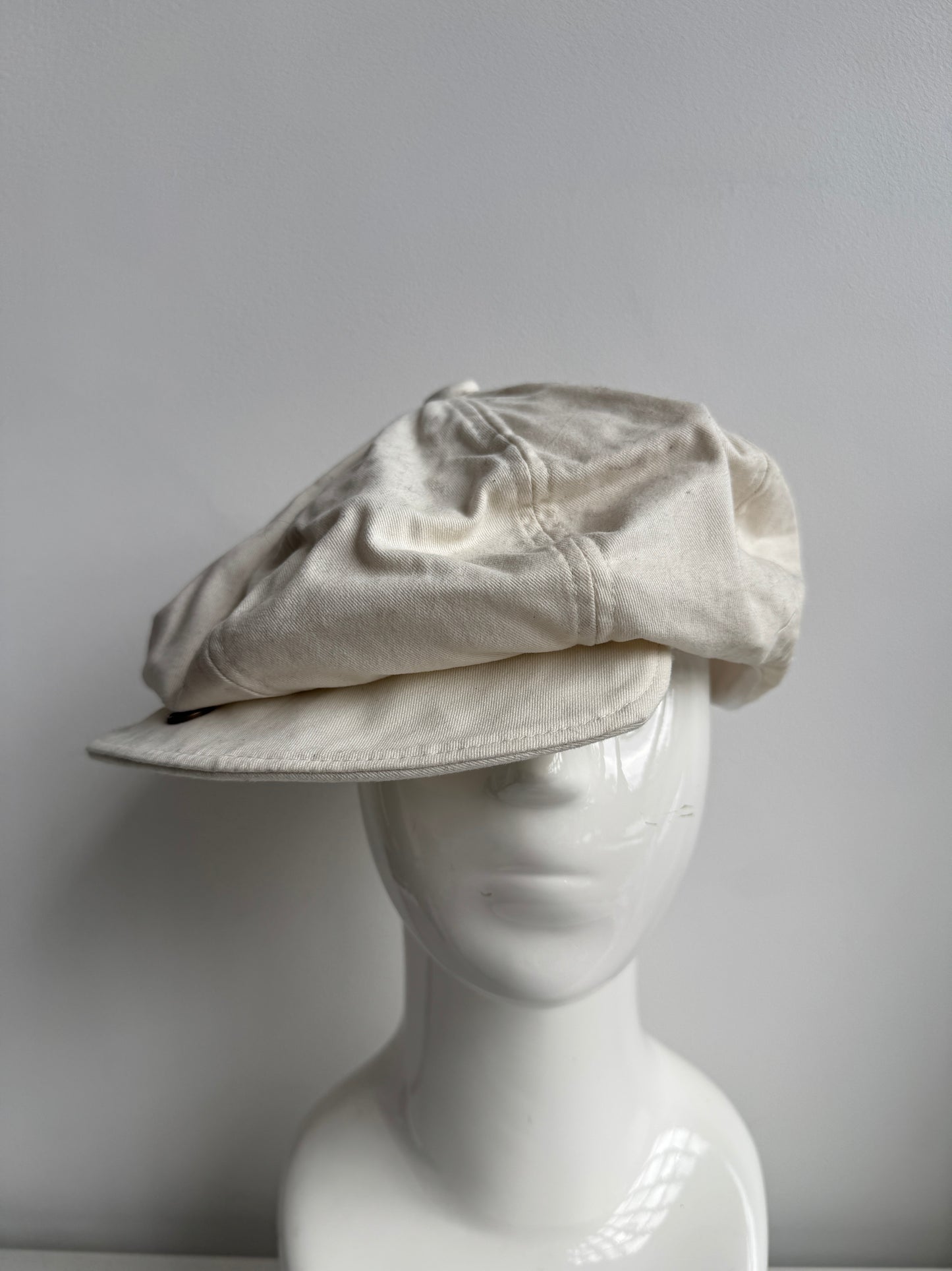 white buttoned casquette hat
