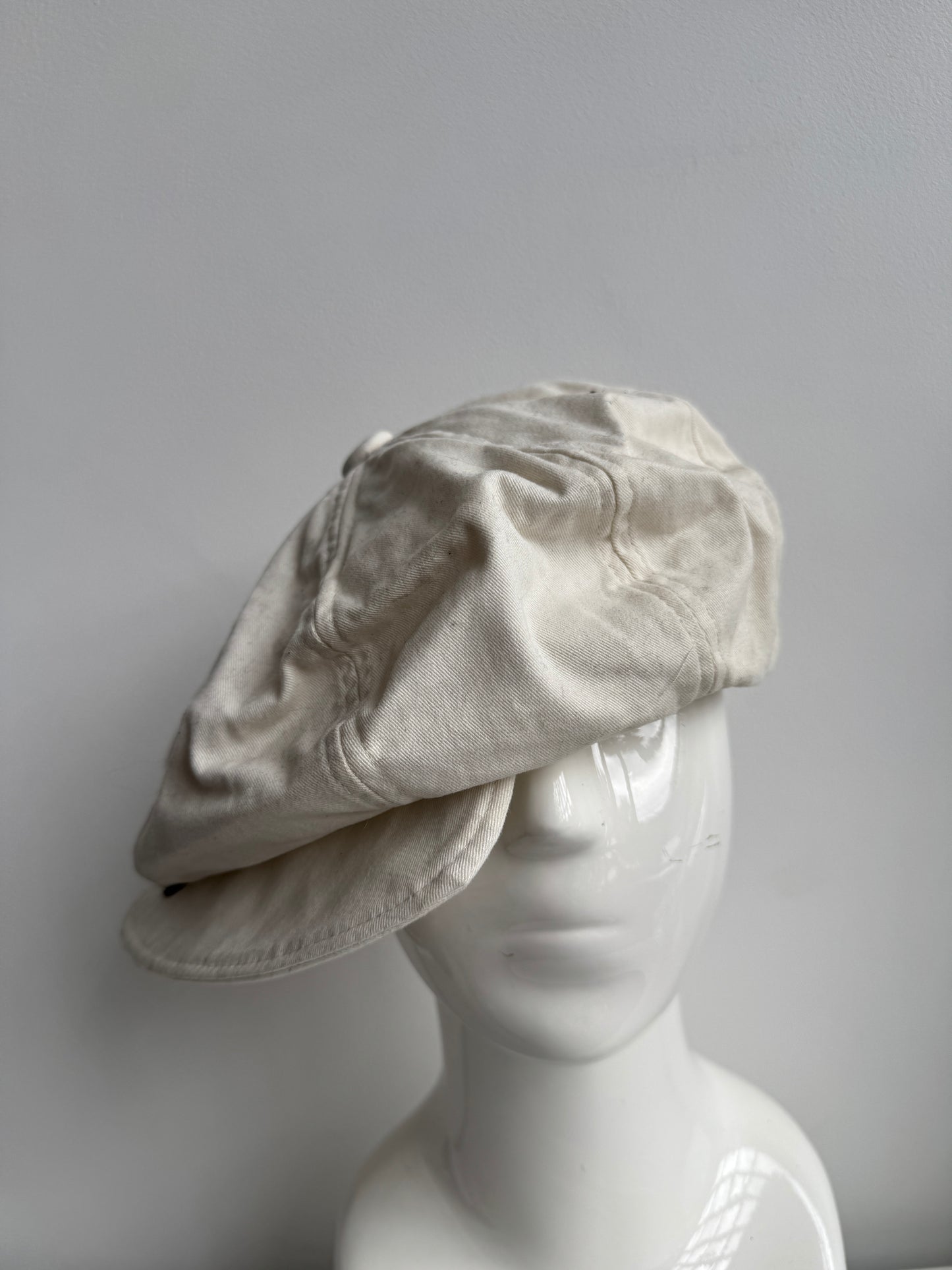 white buttoned casquette hat