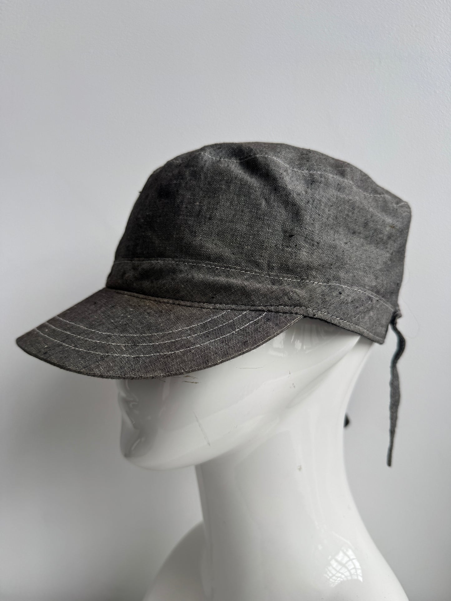 tied back hat