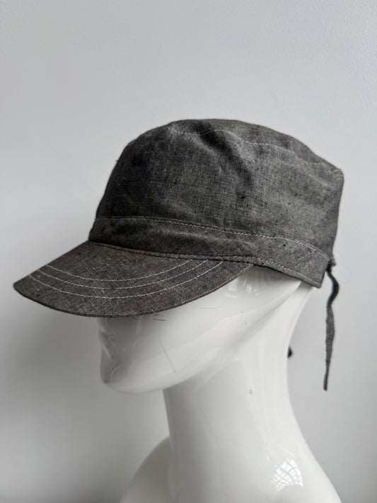 tied back hat
