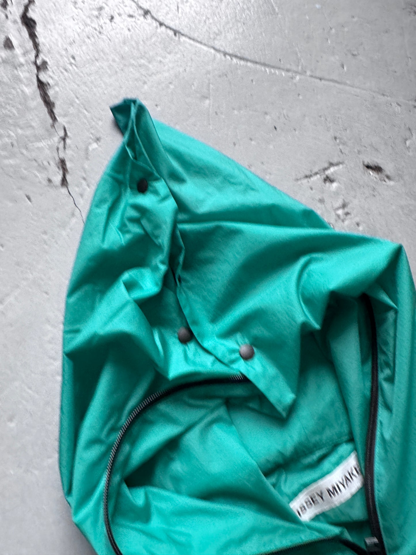 Issey Miyake Buttoned Point Hood Cape Coat