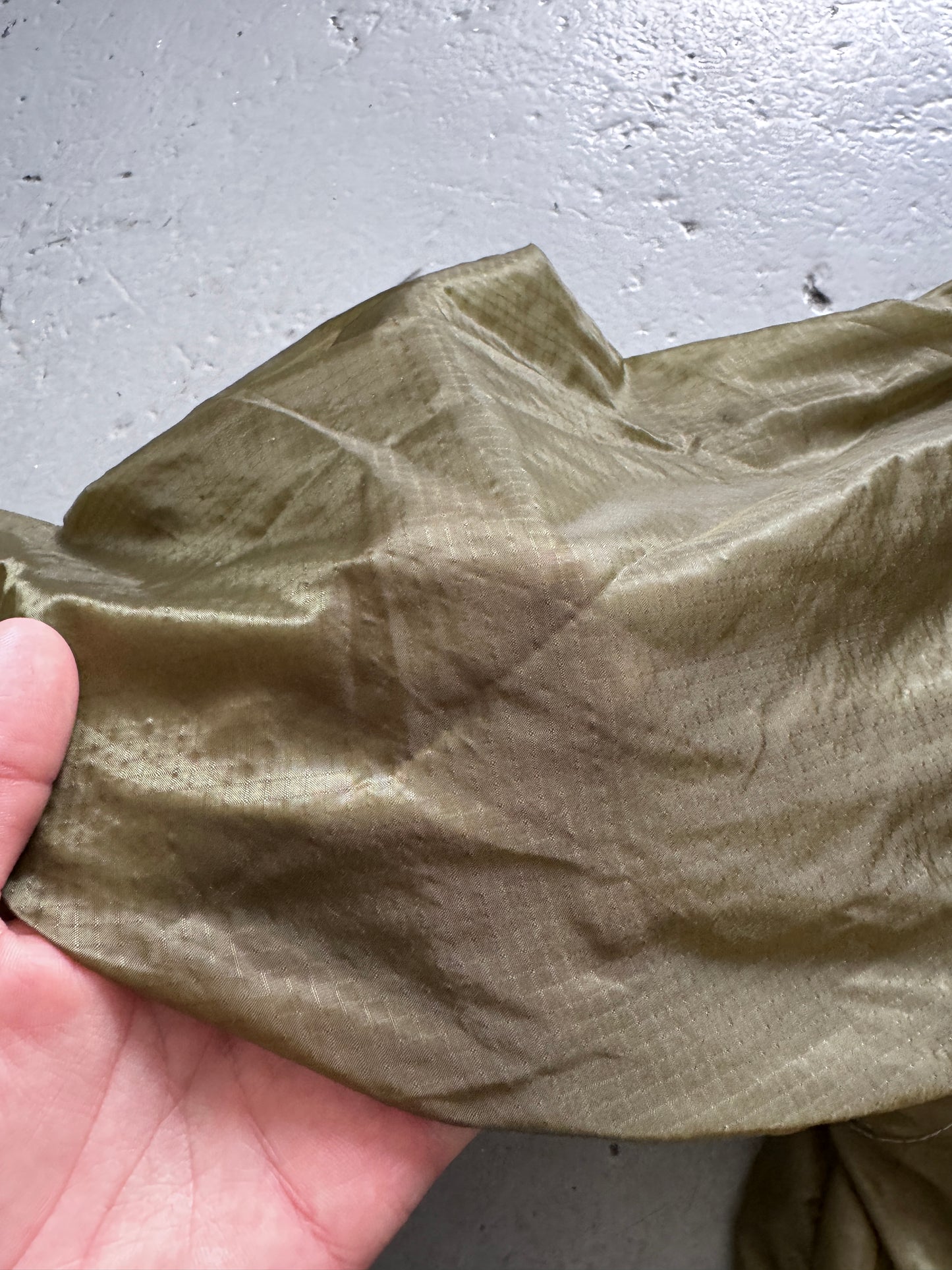 maharishi sheer textile cross front parka