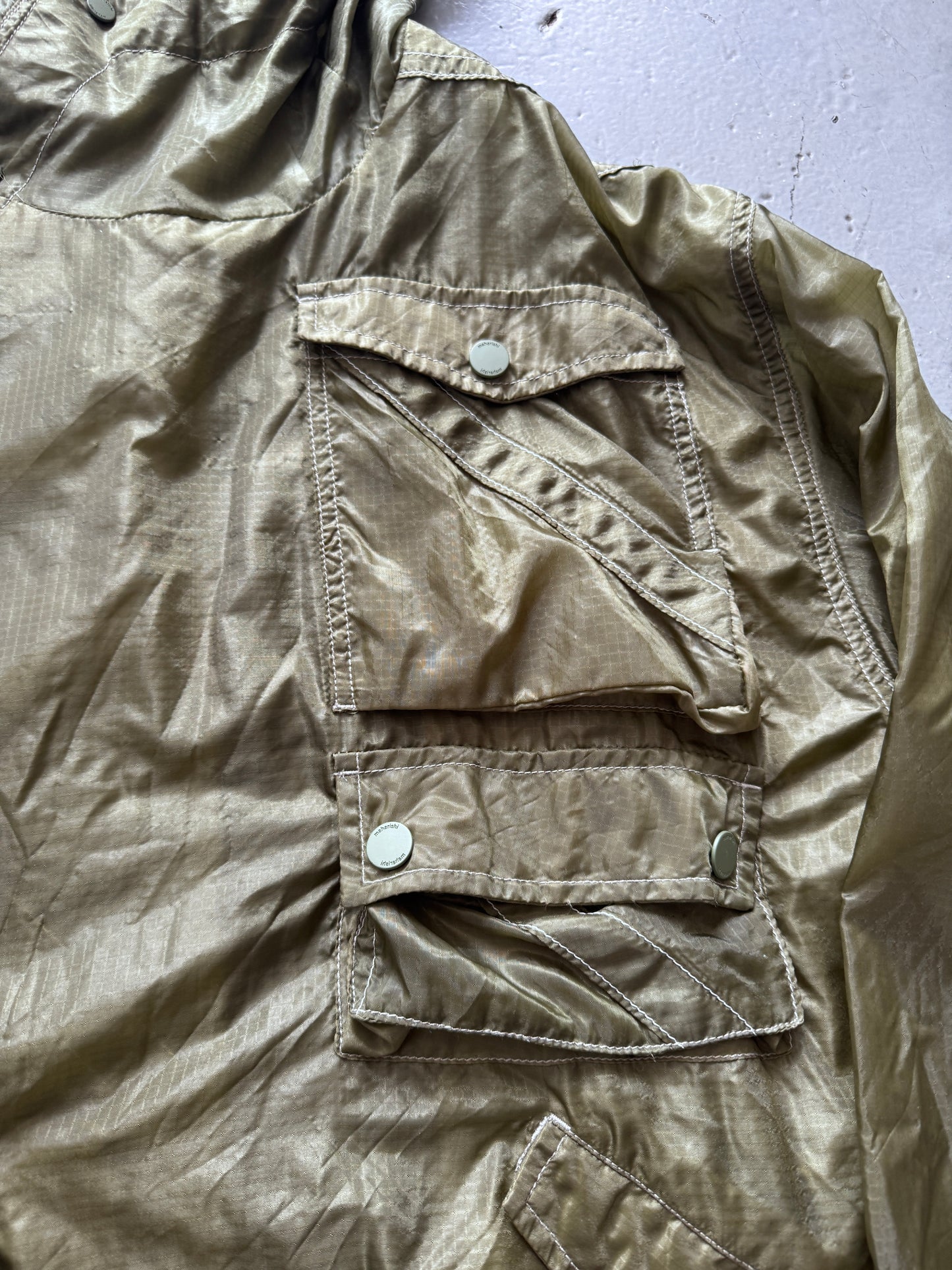 maharishi sheer textile cross front parka