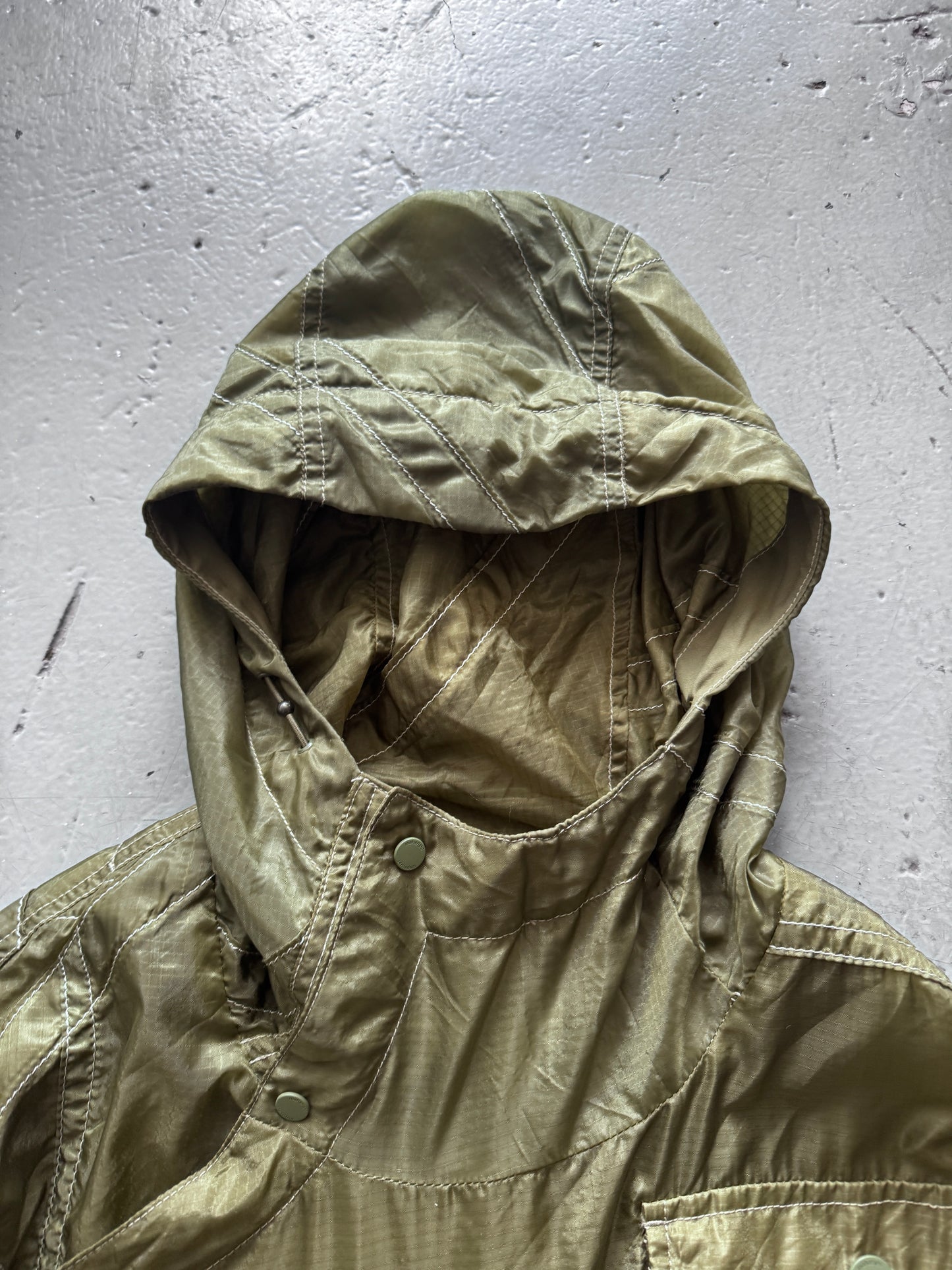maharishi sheer textile cross front parka