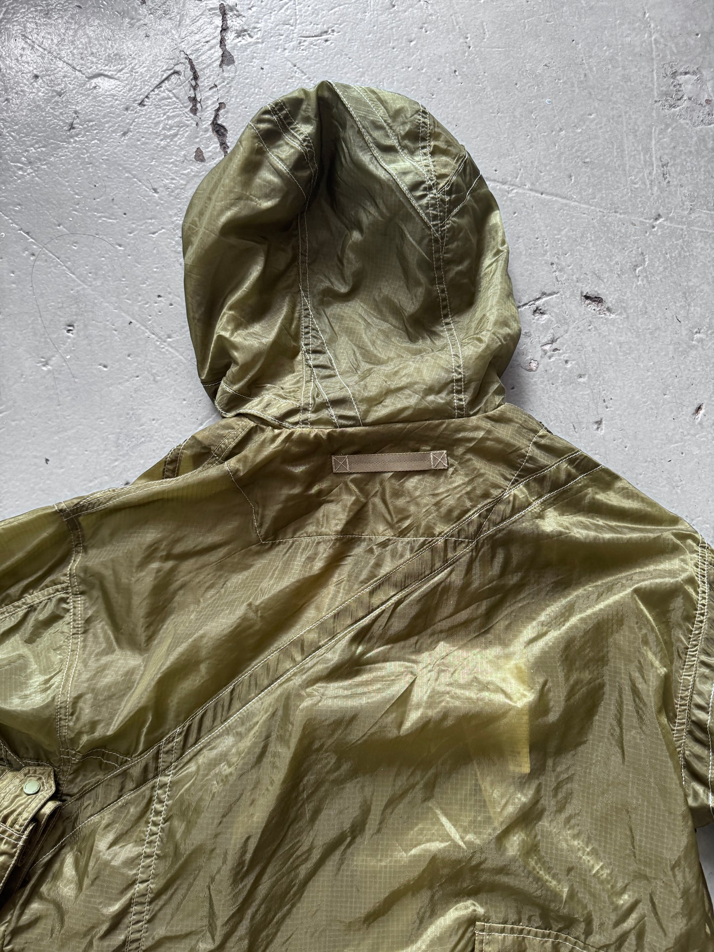 maharishi sheer textile cross front parka